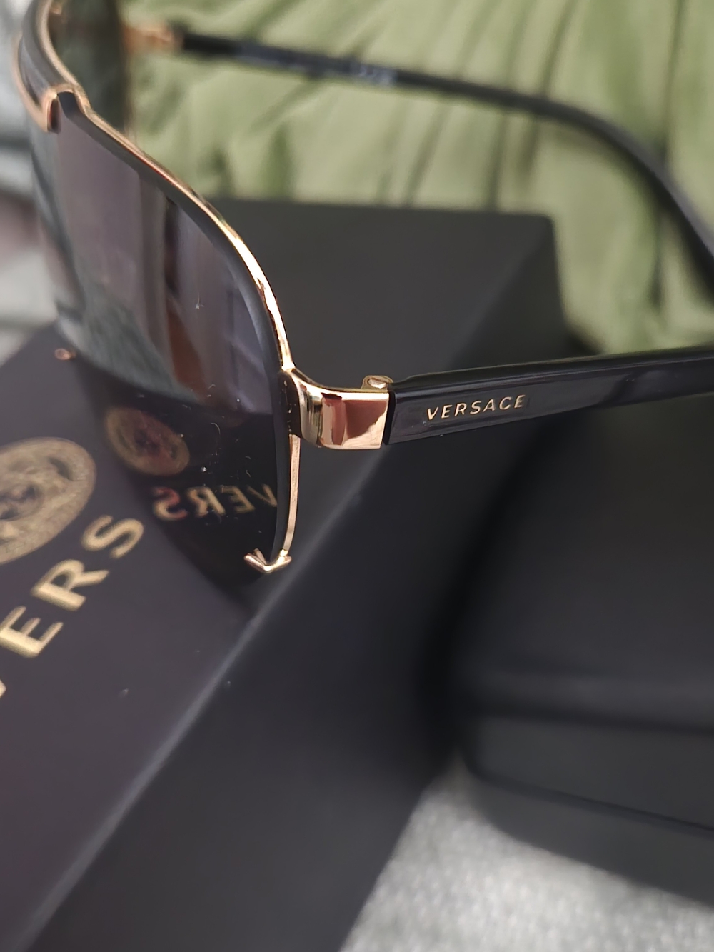 Versace Black and Gold Shield Sunglasses with Gradient Lenses